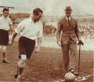 The future King George VI kicks off for the Corinthians against Spurs in 1921.